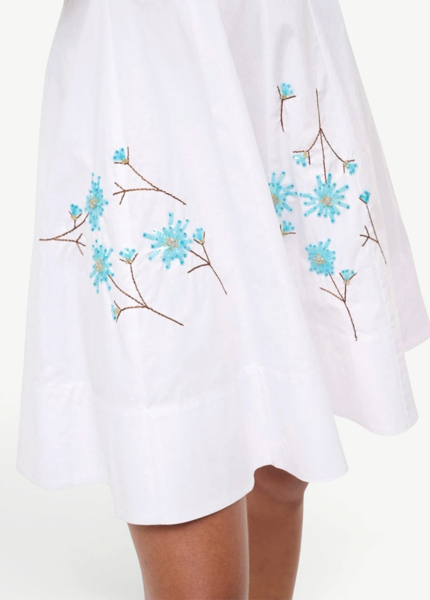 KABE SHOP INC Wells mini dress in white cotton with delicate blue floral embroidery and beaded detailing
