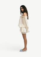 KABE SHOP INC Isabella jumpsuit in cream cotton with off-the-shoulder neckline and delicate lace trim hem