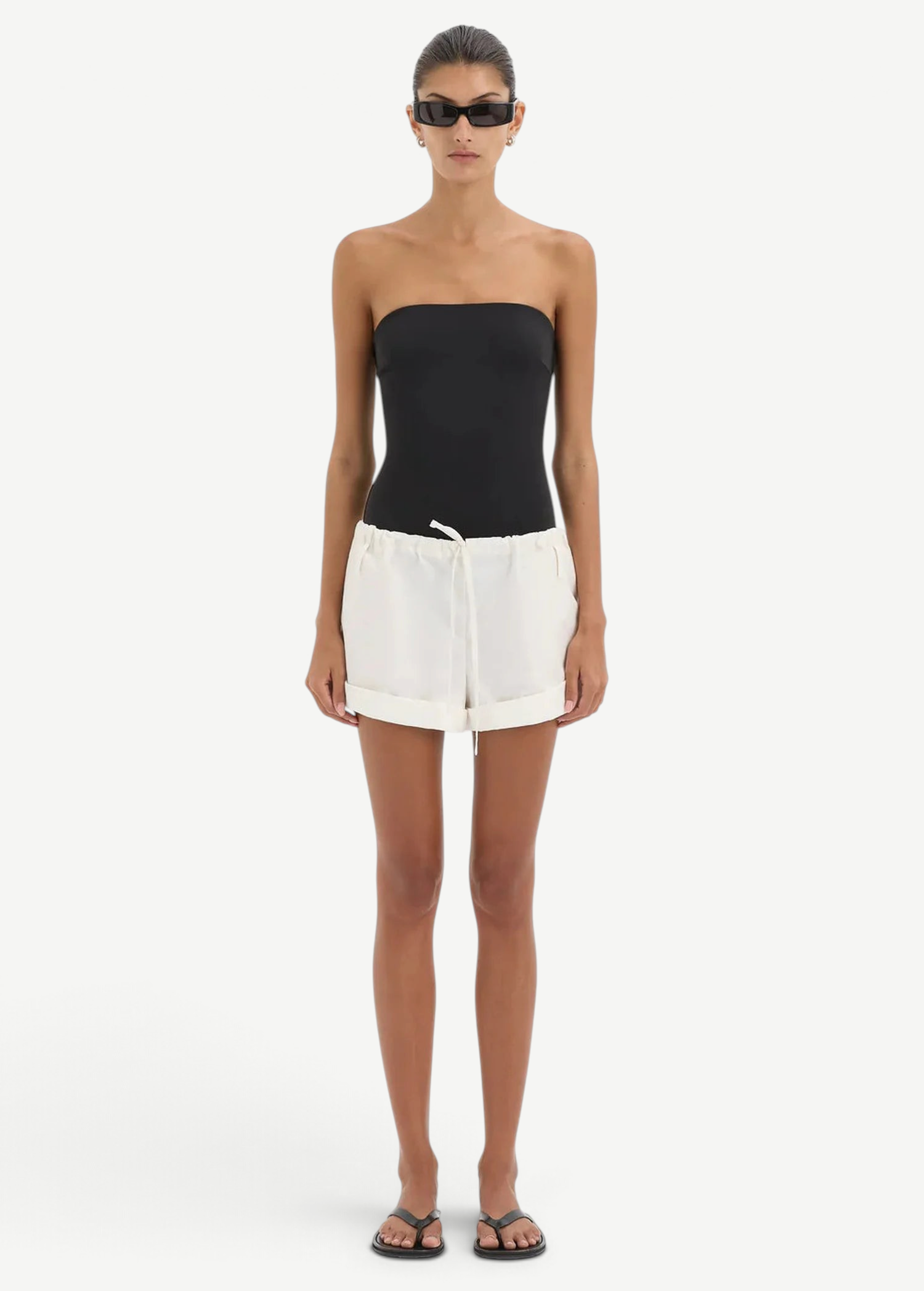 KABE SHOP INC Charlie Rolled Short in white cotton with a drawstring waistband worn by a model in a black bodysuit