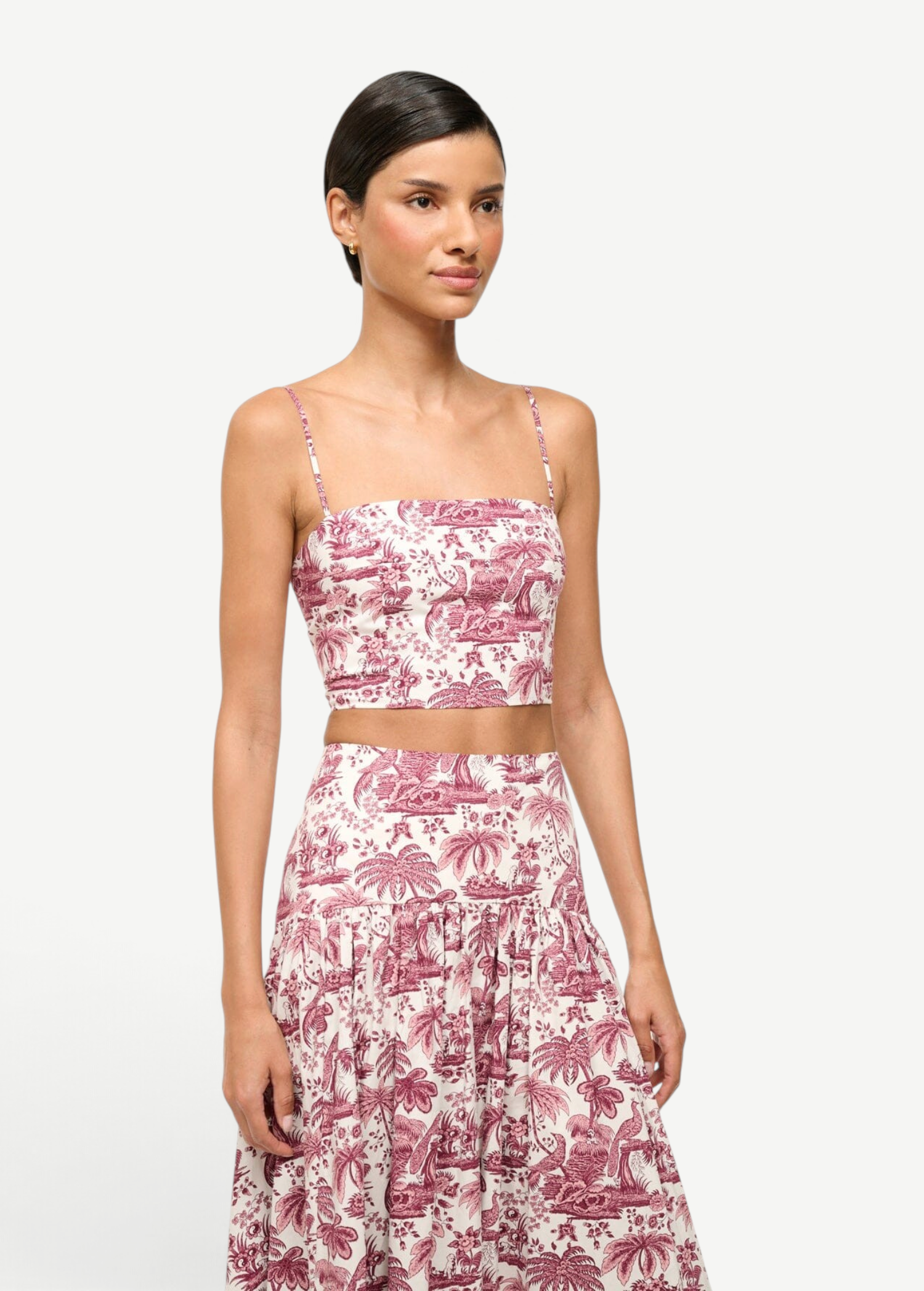 Model wearing KABE SHOP INC Federico cropped tank top in white and burgundy toile de jouy print with spaghetti straps