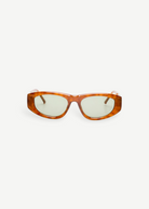 KABE SHOP INC Maya sunglasses with a warm light brown tortoiseshell acetate frame and tinted lenses.