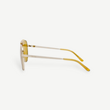 KABE SHOP INC Amelia pilot sunglasses with a gold frame and vibrant yellow tinted lenses, side profile view.