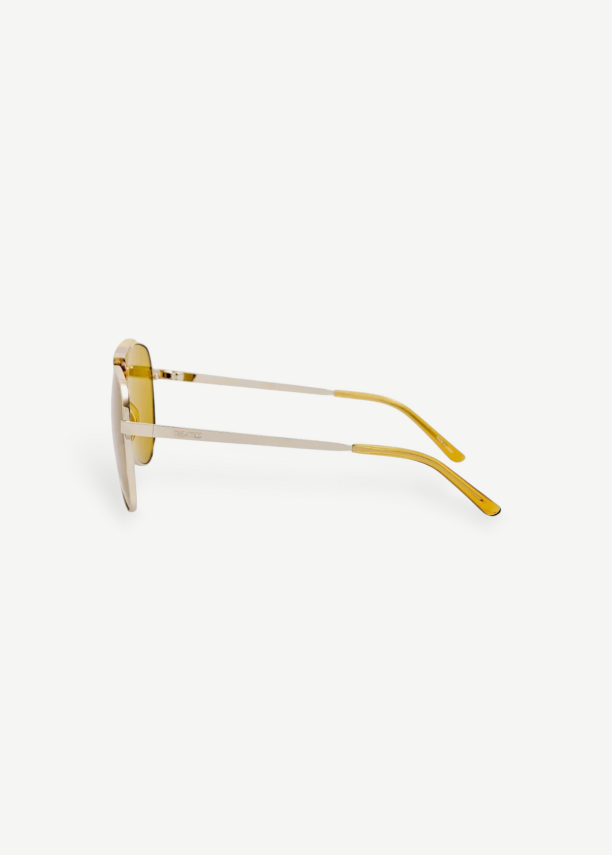KABE SHOP INC Amelia pilot sunglasses with a gold frame and vibrant yellow tinted lenses, side profile view.