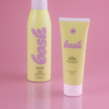 KABE SHOP INC SPF 50 sunscreen lotion and continuous spray mist in yellow packaging on a pink background