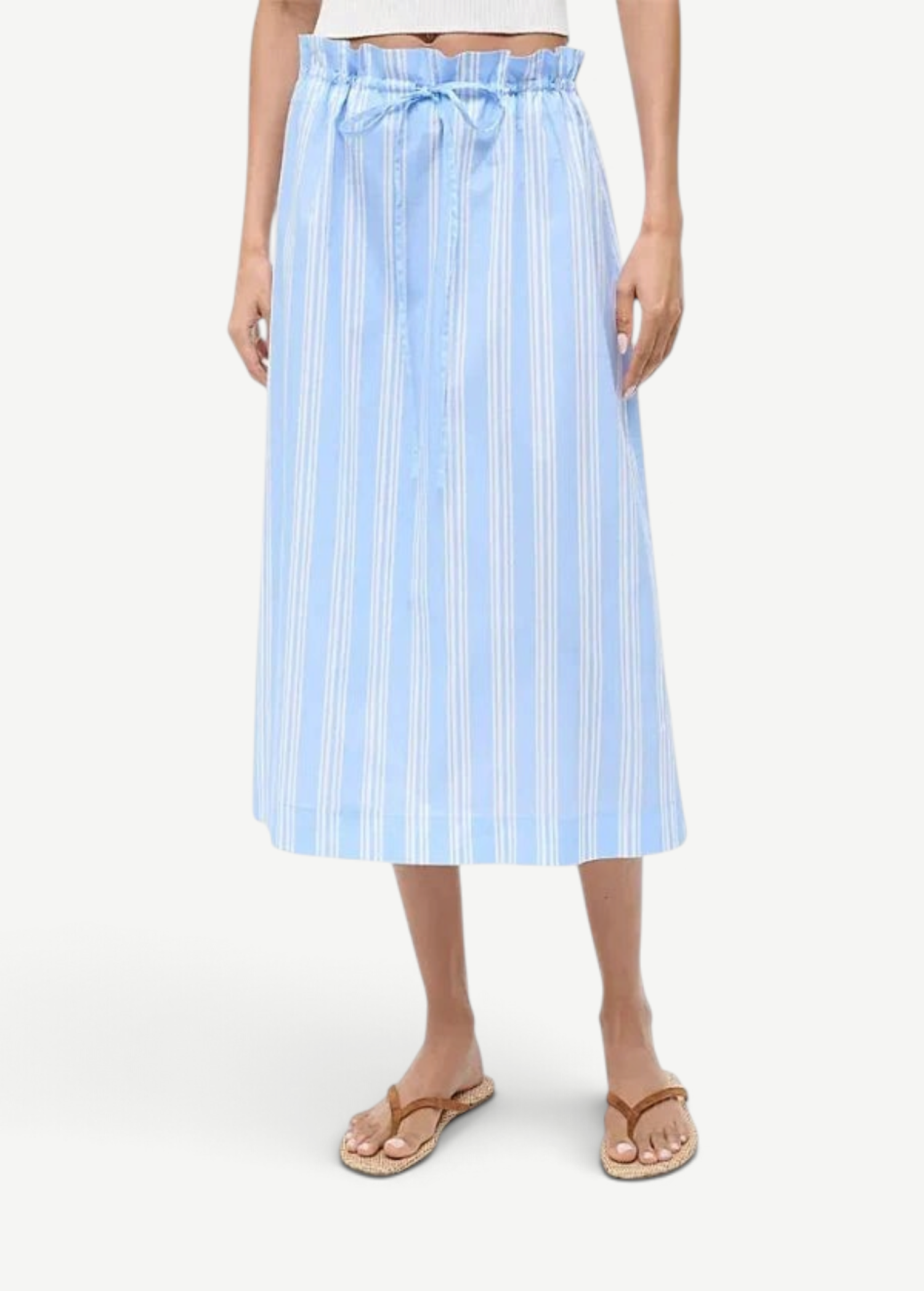 The Shore Skirt is a light blue and white vertical-striped stretch poplin midi skirt featuring a gathered elastic paper-bag waist with a drawstring.
