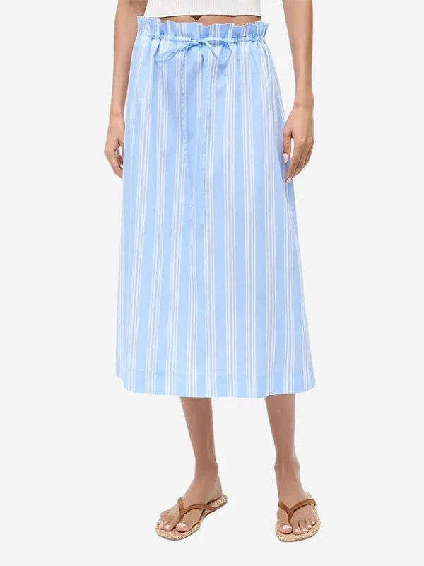 The Shore Skirt is a light blue and white vertical-striped stretch poplin midi skirt featuring a gathered elastic paper-bag waist with a drawstring.