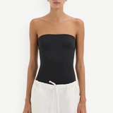 KABE SHOP INC Charlie Rolled Short in white cotton with a drawstring waistband worn by a model in a black bodysuit.