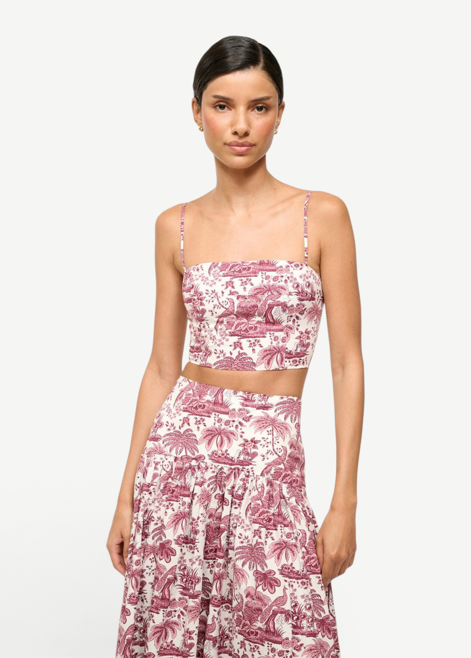 Model wearing KABE SHOP INC Federico cropped tank top in pink and white tropical toile de jouy print