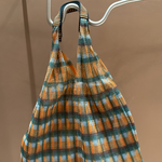 KABE SHOP INC Udaipur bag by ÉPICE featuring a vibrant orange, blue, and white plaid woven mesh fabric