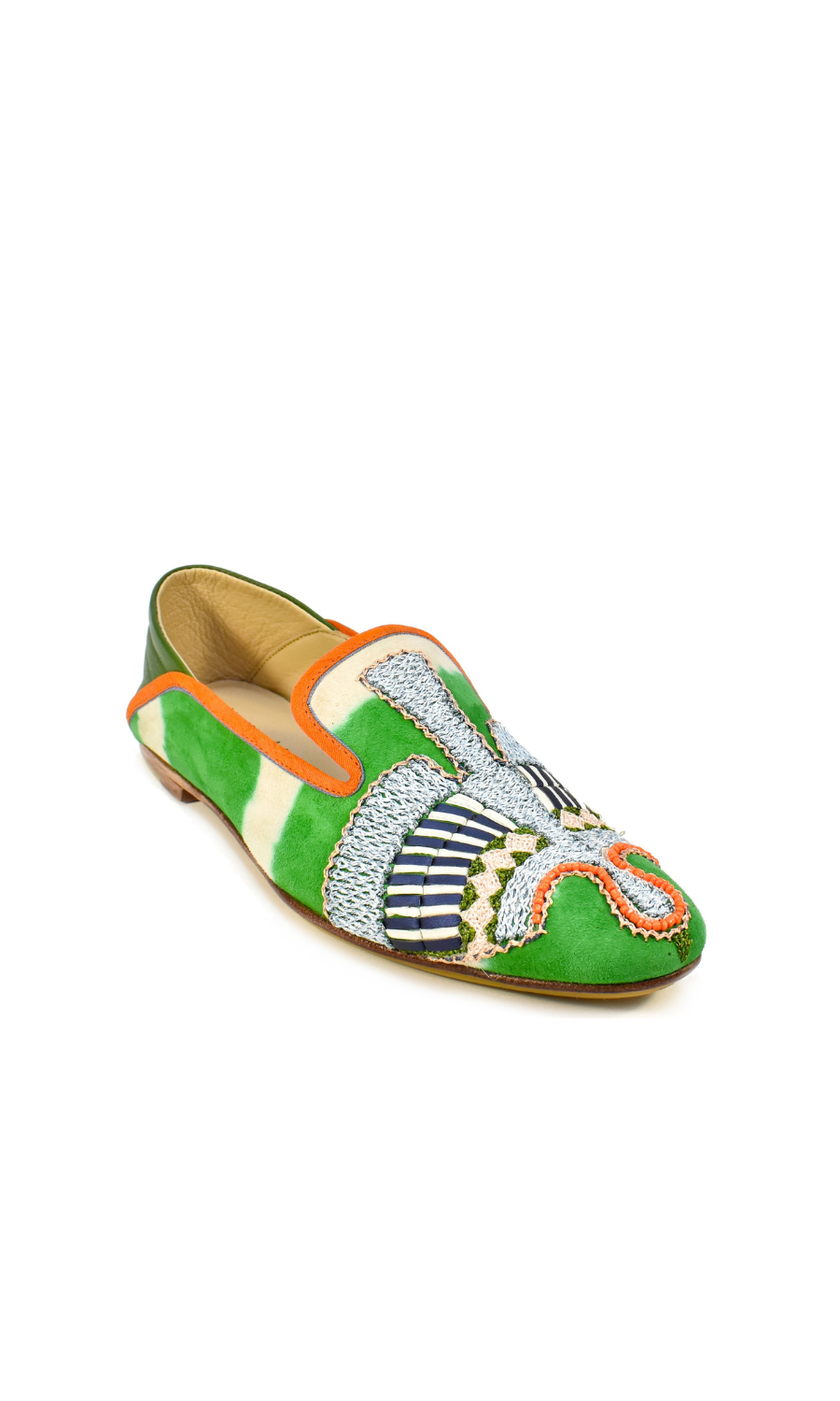 The Anzu Moccasin is a vibrant babouche-style loafer crafted from green, orange, and white suede, adorned with intricate beaded details and hand-embroidered moccasin patterns on the front and sides.