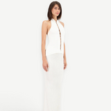 Model wearing KABE SHOP INC Classic Malageta white maxi skirt and matching sleeveless button-down halter top