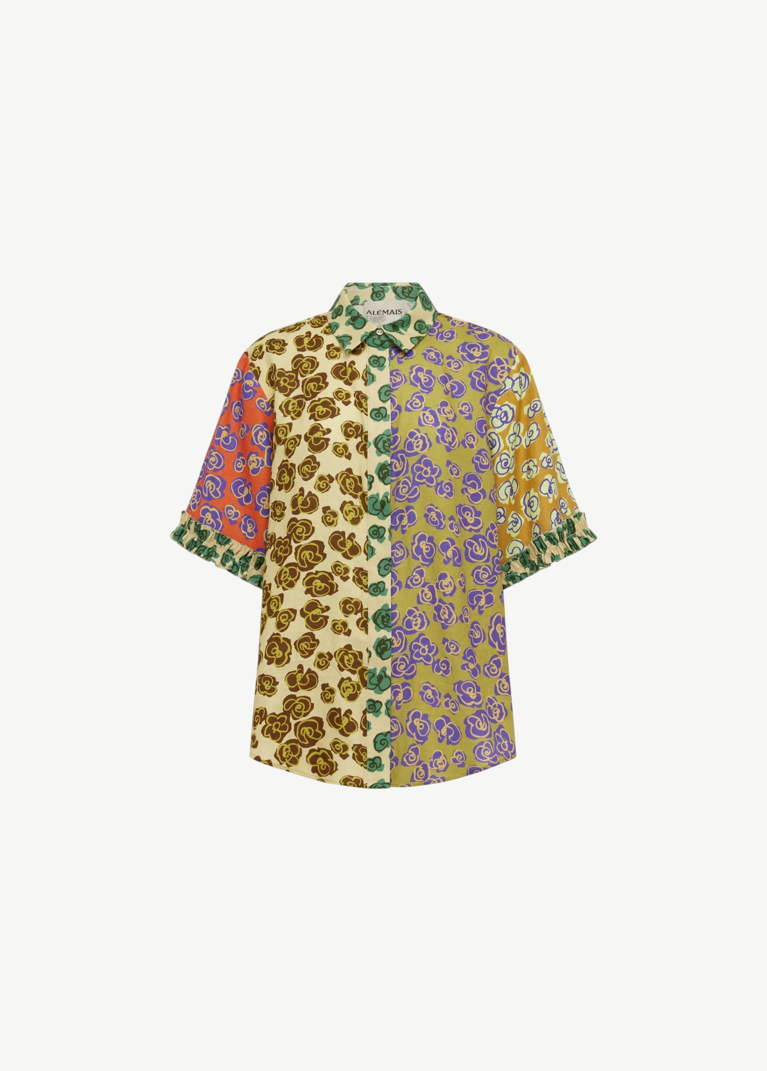 Patty Shirt, a short-sleeved button-up featuring a patchwork of floral prints in orange, brown, green, and purple, with ruffled cuffs for a contemporary touch.