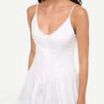 KABE SHOP INC Dena mini dress in white cotton poplin with a fitted bodice, drop waist, and spaghetti straps.