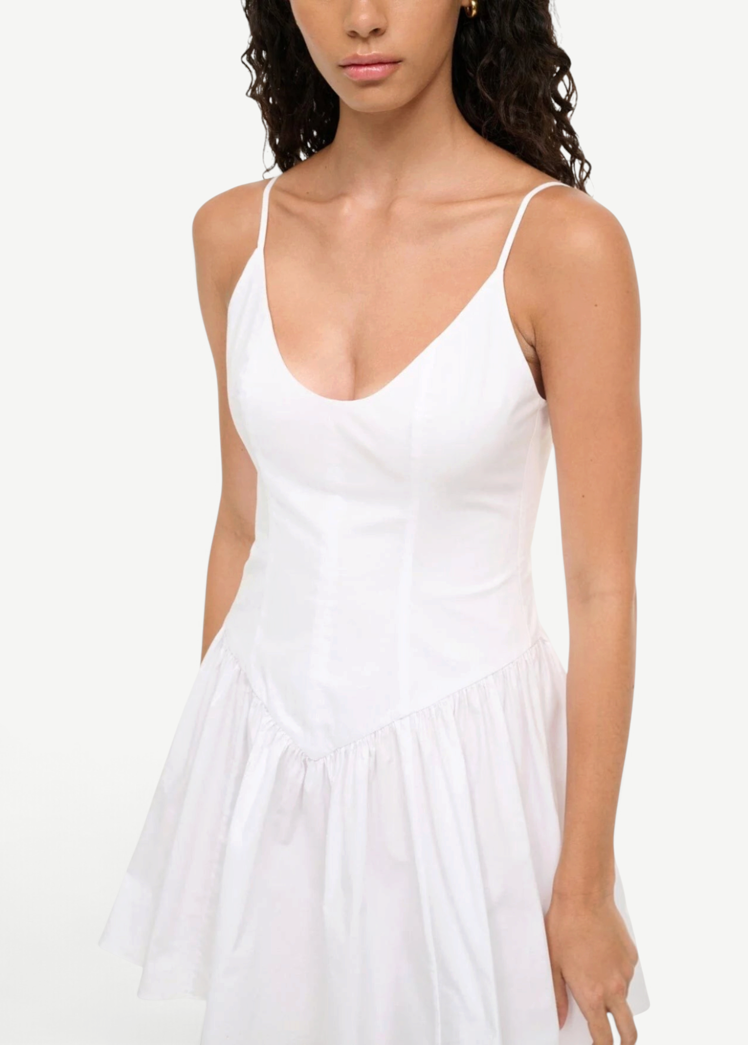 KABE SHOP INC Dena mini dress in white cotton poplin with a fitted bodice, drop waist, and spaghetti straps.