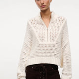 Off-white Cropped Hampton Sweater with a quarter-zip neckline and an open-knit texture, serving as a versatile knit for everyday dressing.