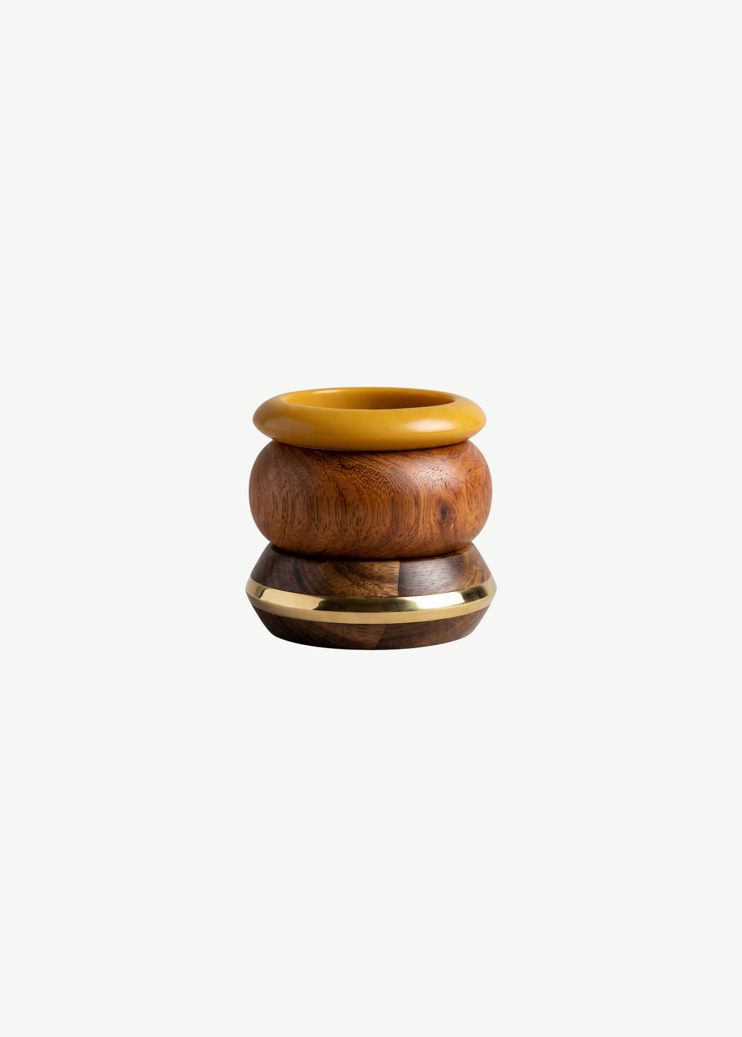 KABE SHOP INC set of three sculptural bangles featuring yellow resin, natural wood, and a gold metal accent band.