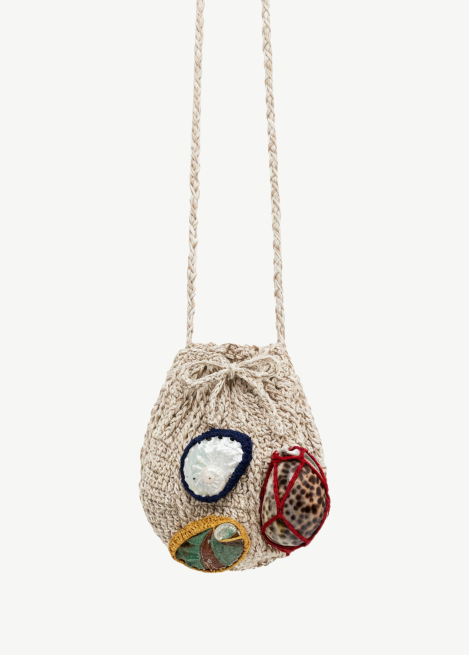 KABE SHOP INC Jali Bag in beige knit with decorative shell accents and braided shoulder strap
