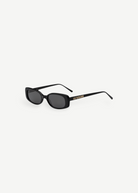 KABE SHOP INC Solene slim rectangular black sunglasses with dark lenses and gold logo detail on the temple
