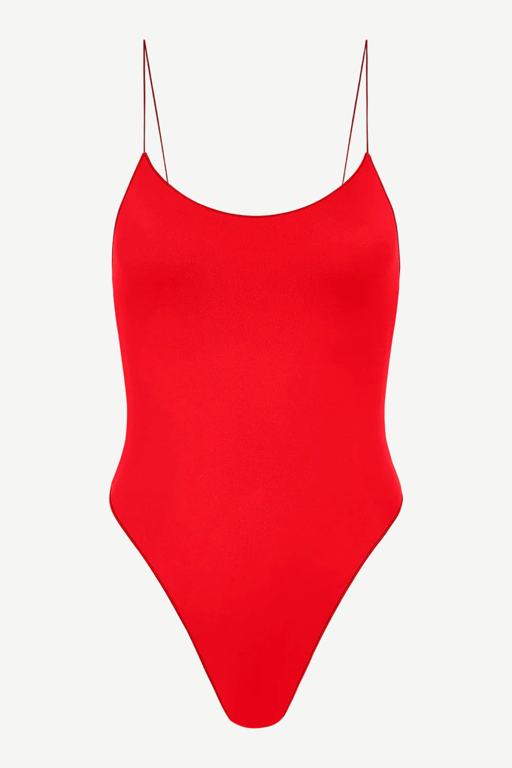 The C One Piece is a vibrant red one-piece swimsuit made from recycled nylon, featuring thin spaghetti straps and a high-cut leg, shown against a plain white background.
