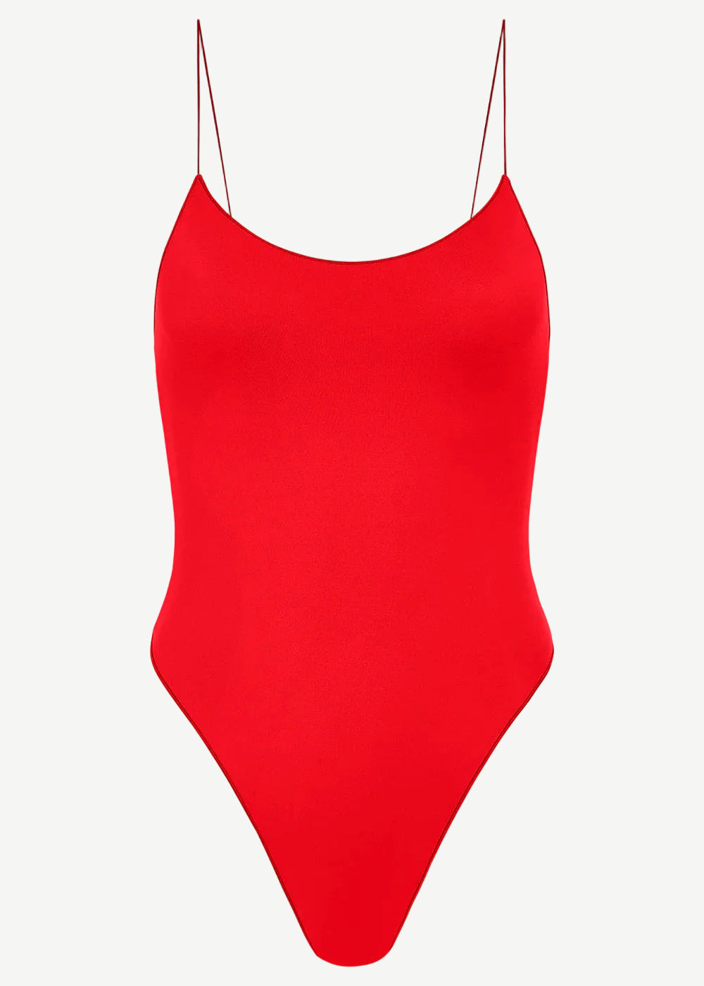 The C One Piece is a vibrant red one-piece swimsuit made from recycled nylon, featuring thin spaghetti straps and a high-cut leg, shown against a plain white background.
