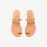 KABE SHOP INC Audrey sandals in tan leather with crystal-embellished toe-loop straps and a minimalist flat design.