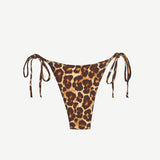 Praia Bottom in a leopard print, featuring a minimal coverage triangle bikini design with adjustable side ties, displayed on a white background.
