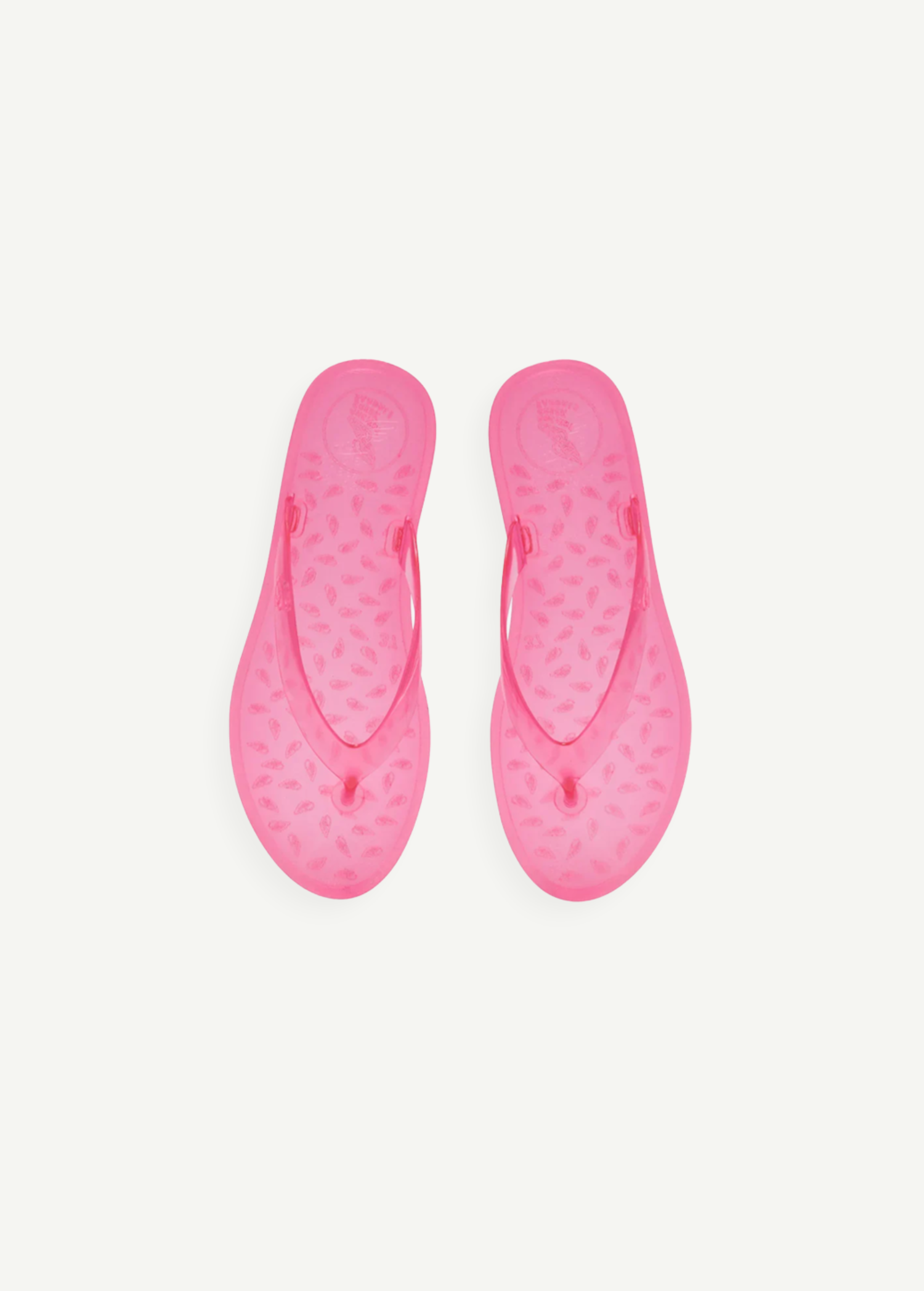 KABE SHOP INC bright pink jelly flip flops with a textured teardrop pattern on the footbed for summer wear.