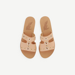 KABE SHOP INC Apteros slide sandals in tan leather with silver and gold metallic eyelet hardware details.