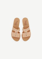 KABE SHOP INC Apteros slide sandals in tan leather with silver and gold metallic eyelet hardware details.
