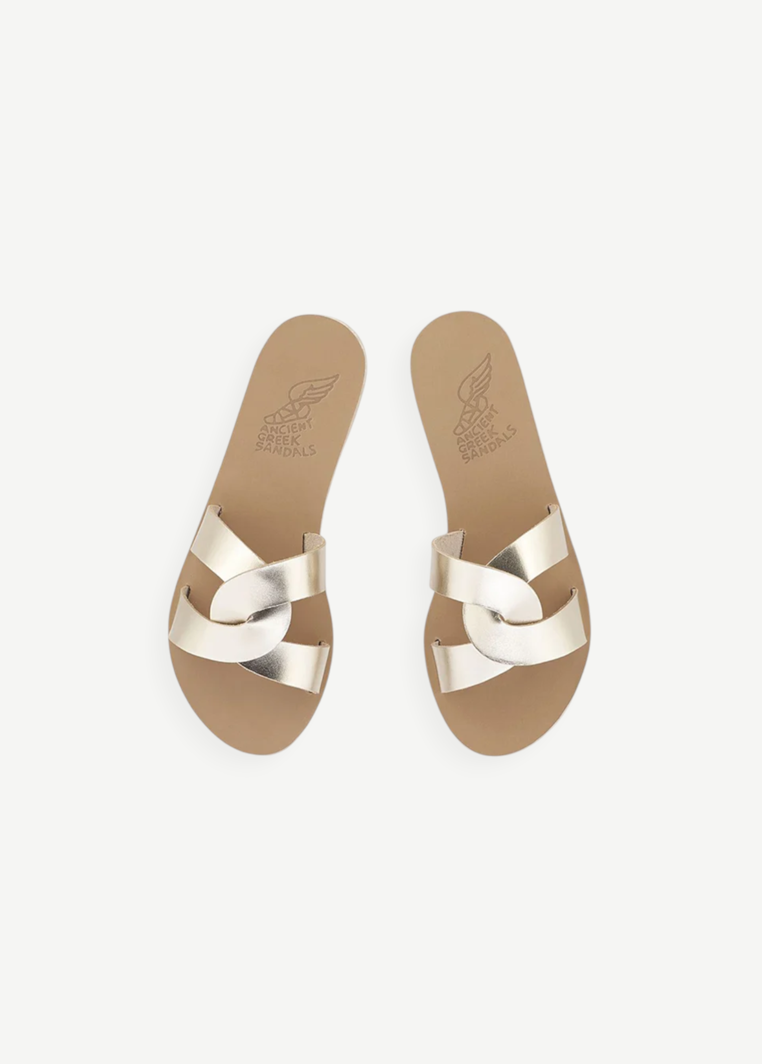 KABE SHOP INC Desmos sandals in metallic gold leather with elegant interlocking straps and a flat tan sole.
