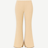 KABE SHOP INC Malaika ivory high-waisted pants with flared legs and decorative dark contrast whipstitch detailing.