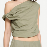 Alice Top in sage green, an asymmetric one-shoulder sleeveless crop top with a gathered, knotted detail at the shoulder for a sculptural finish.