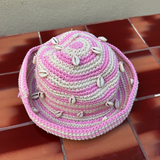 KABE SHOP INC handmade crochet hat in pink and beige with decorative sea shells, artisanal Tulum design