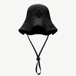 KABE SHOP INC black woven straw bucket hat with a decorative chain strap detail and wide brim