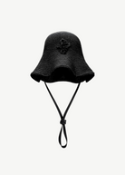KABE SHOP INC black woven straw bucket hat with a decorative chain strap detail and wide brim