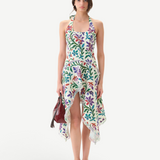 Model wearing KABE SHOP INC Belora cotton dress with floral pixel print, asymmetric hem, and raw-edge detailing.