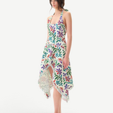 Model wearing KABE SHOP INC Belora cotton dress with floral embroidery, asymmetric hem, and raw-edge detailing.