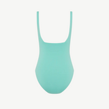 The Margot One Piece Swimwear is a luxurious swimsuit in plain light turquoise, featuring thick shoulder straps and crafted from soft Embodee fabric, displayed on a white background.