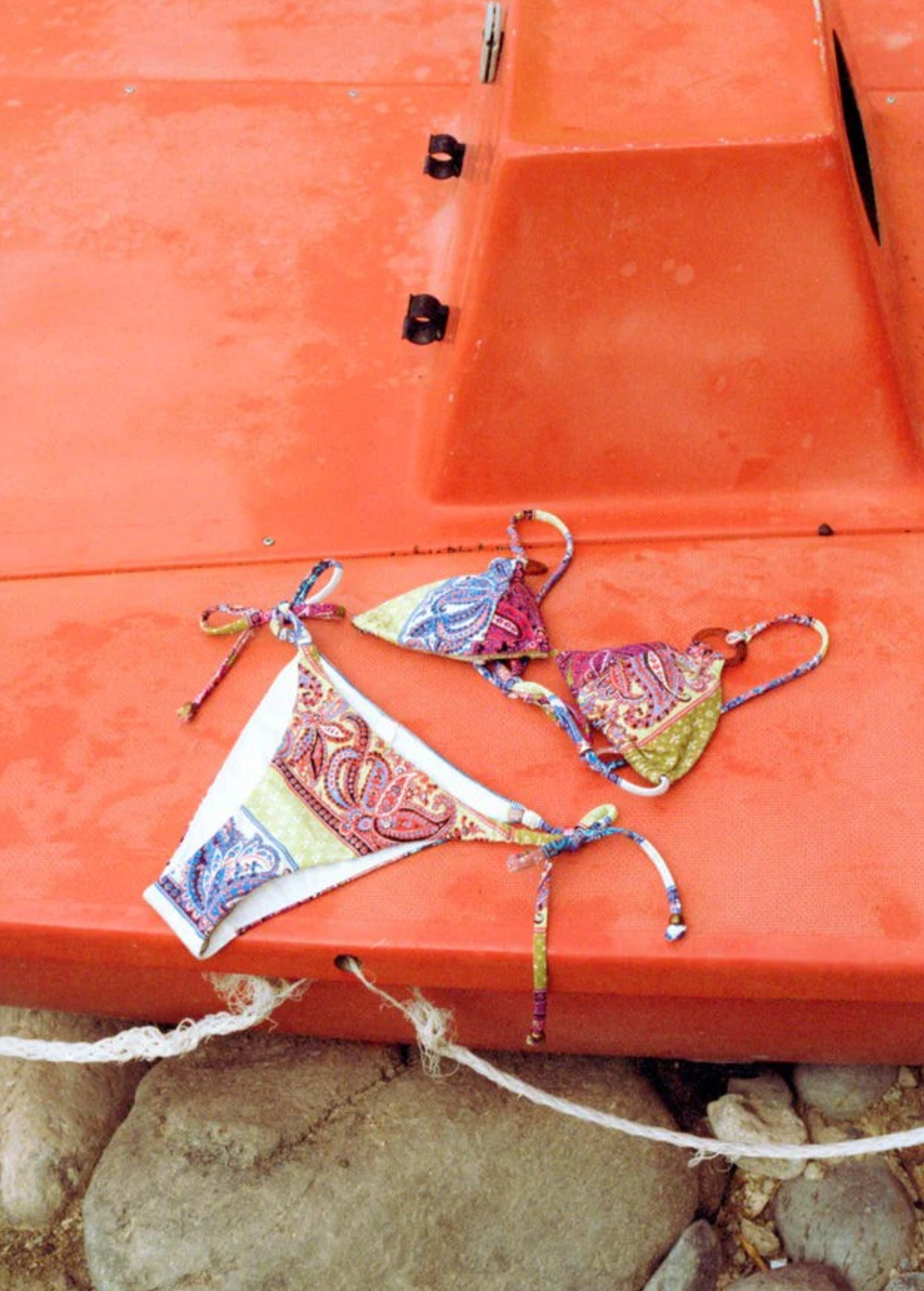 KABE SHOP INC Marseille Lizzy tie-side bikini set in a vibrant paisley print with earthy and bright tones.