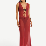 Model wearing a KABE SHOP INC Harper red sheer mesh maxi dress with a front tie detail over a dark bikini