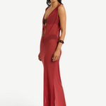 KABE SHOP INC Harper maxi dress in sheer red mesh with a deep V-neck and tie front, worn by a model over swimwear.