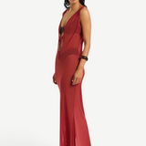 KABE SHOP INC Harper maxi dress in sheer red mesh with a deep V-neck and tie front, worn by a model over swimwear.