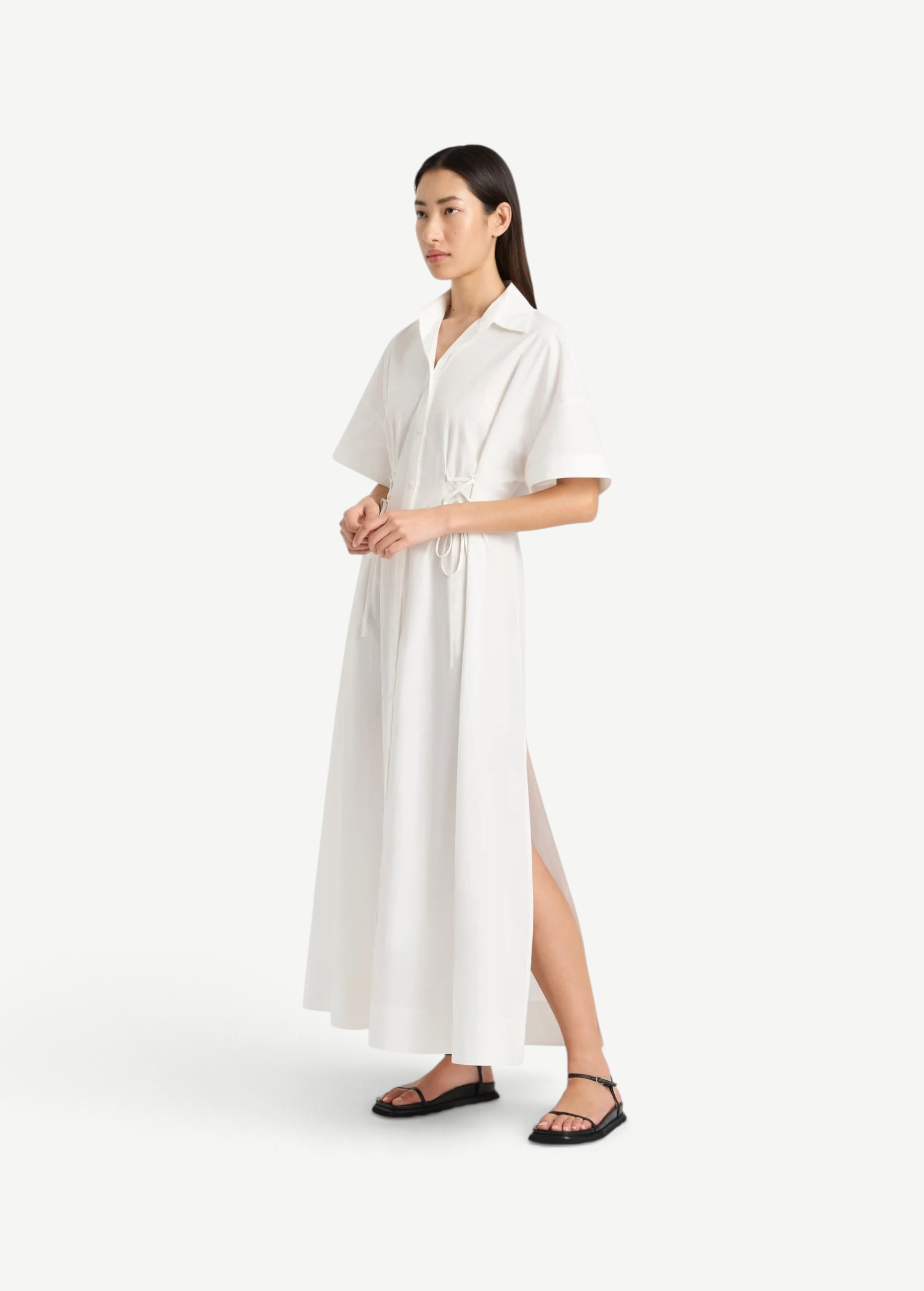 KABE SHOP INC Kyoto white lace-up shirt dress with short sleeves and side slits worn by a model