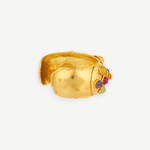 Introducing the Theodora Cuff: a wide, handcrafted gold cuff bracelet with a textured finish, adorned on one side with an eye-catching arrangement of vibrant round stones in purple, orange, yellow, and green. Effortlessly wearable, this statement piece is perfect for anyone who loves unique jewelry.