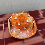 KABE SHOP INC handmade crochet tie-dye bucket hat in orange with white cowrie shell embellishments