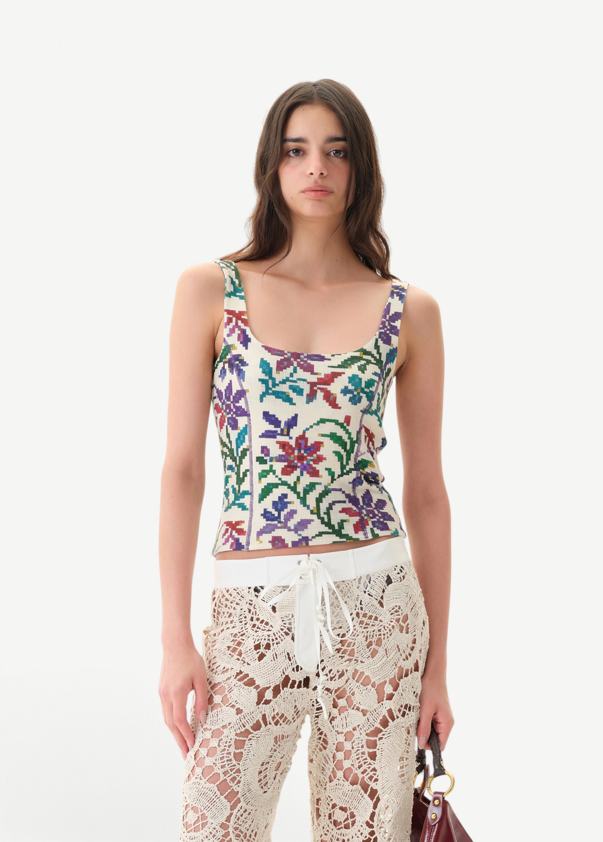 Model wearing KABE SHOP INC Cali Top featuring a multi-colored floral tapestry print with wide straps