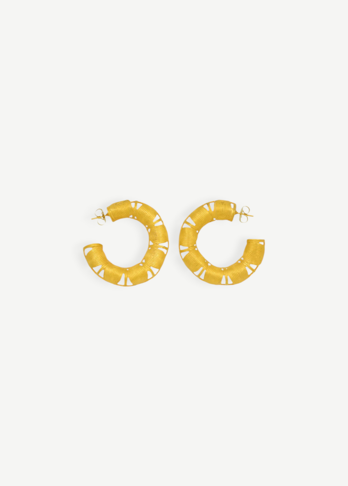KABE SHOP INC Munay gold hoop earrings with intricate spiral ZENU-inspired sculptural details on a white background.