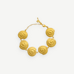 KABE SHOP INC Allinmi gold bracelet featuring Tairona-inspired spiral charms and a delicate chain clasp