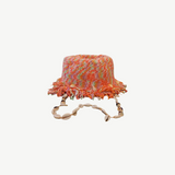 KABE SHOP INC handcrafted multi-colored crochet bucket hat with fringe trim and a decorative seashell chin strap.