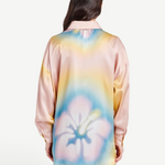Back view of KABE SHOP INC Hibiscus Top in pastel silk with a large floral print and relaxed button-down silhouette.